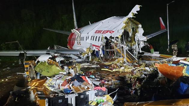 An Air India Express flight en route from Dubai skidded off the runway while landing at Kozhikode International Airport, in Kozhikode, Kerala on Friday.(HT Photo) An Air India Express flight en route from Dubai skidded off the runway while landing at Kozhikode International Airport, in Kozhikode, Kerala on Friday.(HT Photo)