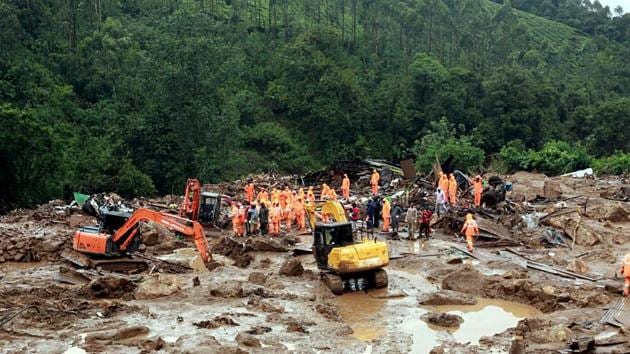 Rescue operations are going on by the NDRF team on the ground after a landslide at Pettimudi, Idukki district, in Kochi on Saturday.(ANI)