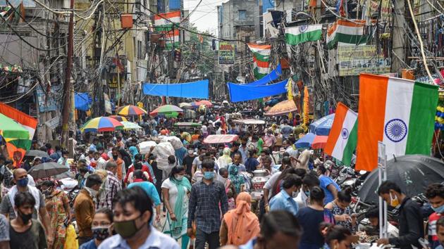 Crowded Sadar Bazar near Bara Tooti Chowk as people, not adhering to social distancing norms, shop ahead of the Janmashtami festival and Independence Day in New Delhi.(PTI Photo)