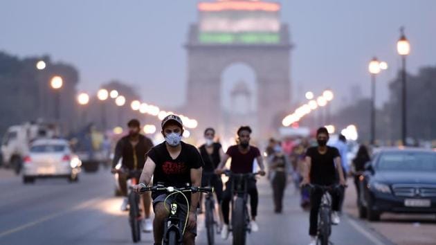 Cyclists at Rajpath in New Delhi on August 9, 2020. Even as the Covid-19 recovery rate continues to improve steadily, with 53,879 Covid-19 patients having recovered and been discharged in the past 24 hours; the Union Ministry has advised the state governments to firmly focus on comprehensive tracking, prompt isolation and effective treatment. (Arvind Yadav / HT Photo)