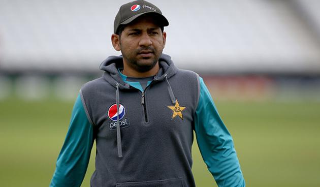 Sarfaraz Ahmed was seen performing 12th-man duties during the first Test against England.(Getty Images)