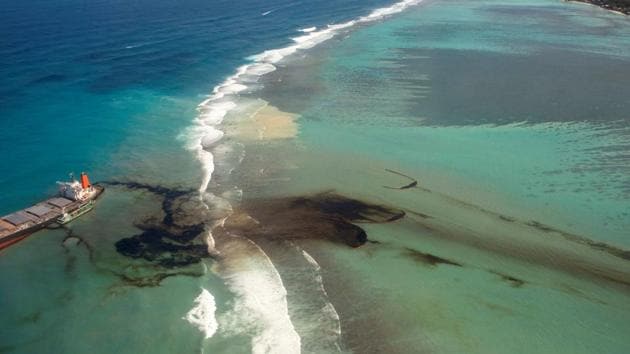 An aerial view shows the bulk carrier ship MV Wakashio that ran aground on a reef at Riviere des Creoles in Mauritius, on August 10. MV Wakashio has leaked at least an estimated 1,000 tonnes of oil after it ran ashore off the southeastern coast of the island of Mauritius on July 25, Reuters reported. (French Army command via REUTERS)