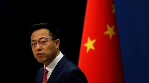 Chinese Foreign Ministry spokesman Zhao Lijian attends a news conference in Beijing, China.(REUTERS)