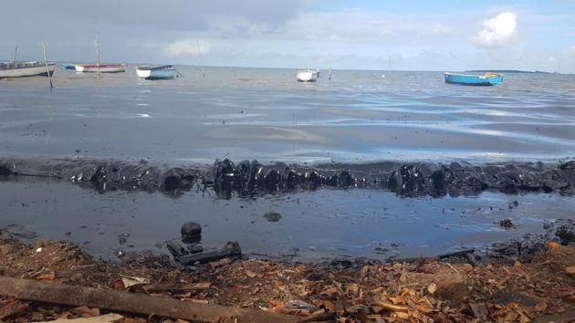 A view of the oil polluting the foreshore of the public beach at Riviere des Creoles in Mauritius on August 8.The incident has befouled the white-sand beaches of the Mauritian coast and left the Indian Ocean island nation facing widespread pollution. Its economy, which relies heavily on tourism, is already reeling from the coronavirus fallout and may be further affected by the spill, Reuters reported. (Sophie Seneque via AP)