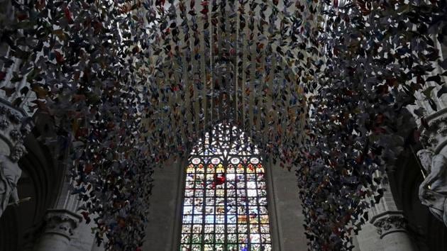 Belgian designer and artist Charles Kaisin creates Origami for Life with 20,000 origami in Brussels, Belgium. (REUTERS/Yves Herman)