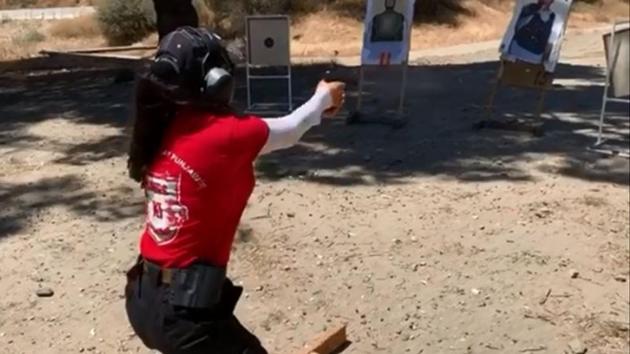 Preity Zinta learning pistol shooting in the US.