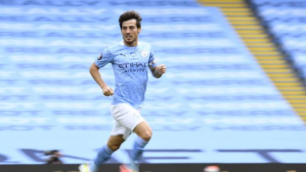 David Silva runs during the English Premier League soccer match between Manchester City and Norwich City at the Etihad Stadium in Manchester, England.(AP)