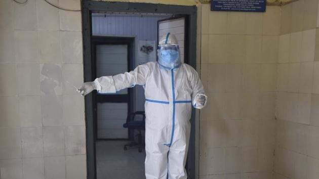 A youth leader of ruling Trinamool Congress in Bengal’s Jhargram district bought and wore a PPE to take a man with Covid-19 symptoms for testing. (Sonu Mehta/HT File photo used for representational purpose only) A youth leader of ruling Trinamool Congress in Bengal’s Jhargram district bought and wore a PPE to take a man with Covid-19 symptoms for testing. (Sonu Mehta/HT File photo used for representational purpose only)