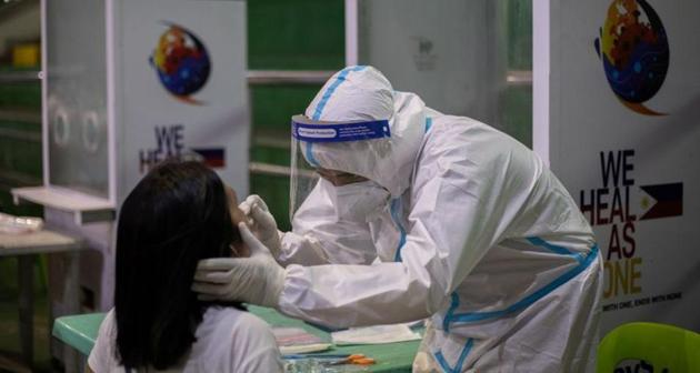 A health worker conducts a coronavirus disease (COVID-19) swab testing at a gymnasium on August 7, 2020. (Representational)(REUTERS)