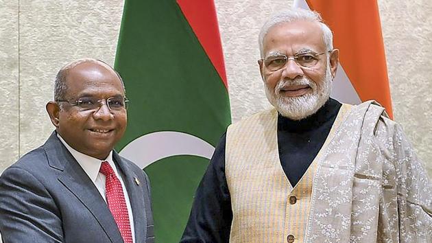 Prime Minister Narendra Modi shakes hands with Minister of Foreign Affairs of the Republic of Maldives Abdulla Shahid.(PTI file photo)