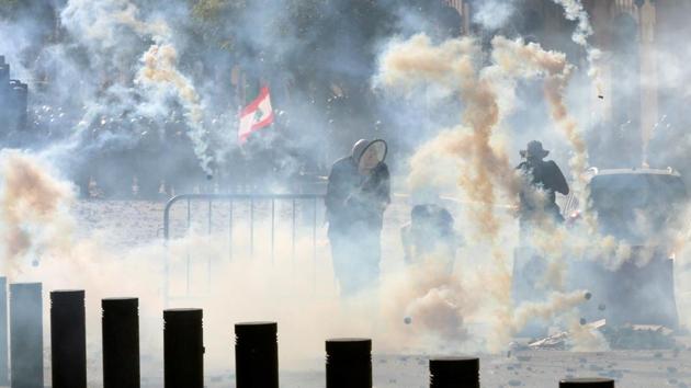 Riot police fire tear gas at demonstrators during a protest, following Tuesday's blast, in Beirut, Lebanon.(Reuters)