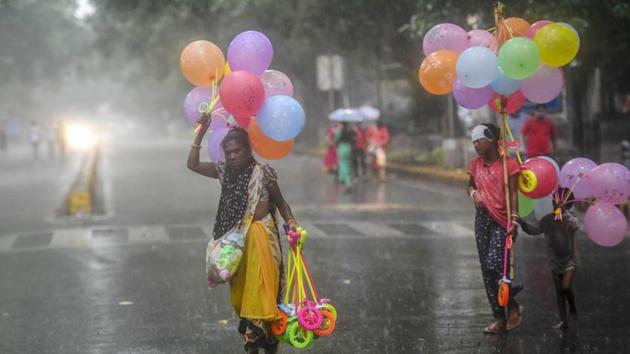 An orange category warning has been issued for Delhi by India Meteorological Department (IMD) authorities on Thursday that implies the disaster control department should be prepared to avert any rain-related incidents. (PTI Photo) An orange category warning has been issued for Delhi by India Meteorological Department (IMD) authorities on Thursday that implies the disaster control department should be prepared to avert any rain-related incidents. (PTI Photo)