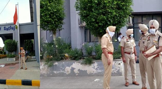 A policeman putting up a new Tricolour in the Moga district administrative complex after two miscreants took away the National Flag, while police investigate the incident on Friday morning.(HT Photos)