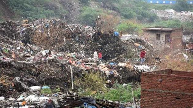 In September 2017, a large portion of the Ghazipur landfill in East Delhi had collapsed that swept motorists on the road in a nearby canal and claimed two lives while leaving many injured.(Raj K Raj/HT PHOTO) In September 2017, a large portion of the Ghazipur landfill in East Delhi had collapsed that swept motorists on the road in a nearby canal and claimed two lives while leaving many injured.(Raj K Raj/HT PHOTO)