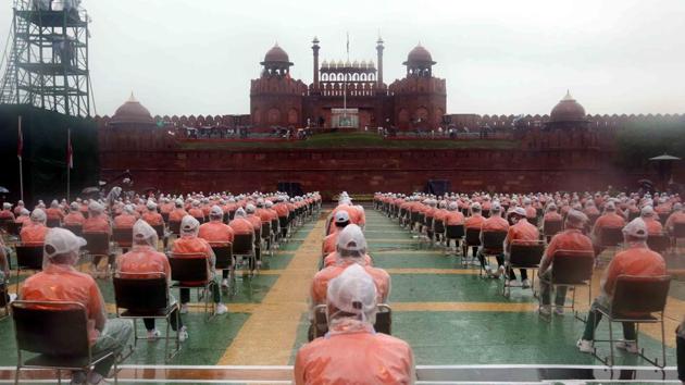 NCC cadets during a full dress rehearsal for the 74th Independence Day celebrations at Red Fort in New Delhi, on August 13. In Delhi, the rehearsal took place amid a downpour. Visuals from the Red Fort exhibited personnel in masks, observing social distancing while marching in line to the tune of the band. (DPR MOD / HT Photo)