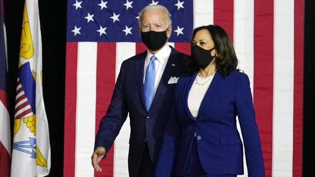 Democratic presidential candidate former Vice President Joe Biden and his running mate Sen. Kamala Harris, D-Calif., arrive to speak at a news conference at Alexis Dupont High School in Wilmington. (AP) Democratic presidential candidate former Vice President Joe Biden and his running mate Sen. Kamala Harris, D-Calif., arrive to speak at a news conference at Alexis Dupont High School in Wilmington. (AP)
