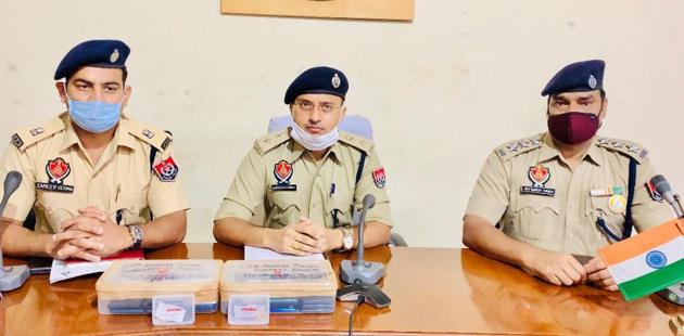 Joint commissioner of police Bhagirath Meena giving details about the arrest in Ludhiana on Friday. (HT Photo) Joint commissioner of police Bhagirath Meena giving details about the arrest in Ludhiana on Friday. (HT Photo)