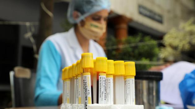 A health team has been assigned for each ward, comprising a nurse and a laboratory technician. Each team is assisted by state revenue department personnel and police. (Bloomberg file photo. Representative image) A health team has been assigned for each ward, comprising a nurse and a laboratory technician. Each team is assisted by state revenue department personnel and police. (Bloomberg file photo. Representative image)