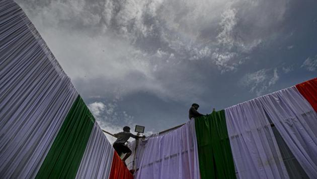 Workers decorate the parade ground ahead of the Independence Day ceremony in Guwahati, on August 13. At the moment, over 1,400 labs in India are equipped and functional to carry out Covid-19 testing. As many as 947 of those are in the public sector while 486 are private. (Anupam Nath / AP) Workers decorate the parade ground ahead of the Independence Day ceremony in Guwahati, on August 13. At the moment, over 1,400 labs in India are equipped and functional to carry out Covid-19 testing. As many as 947 of those are in the public sector while 486 are private. (Anupam Nath / AP)