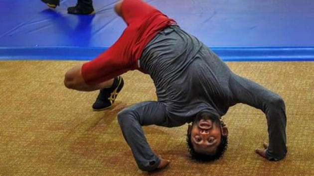 Bajrang Punia ramping at training with coach Bentinidis back by his ...