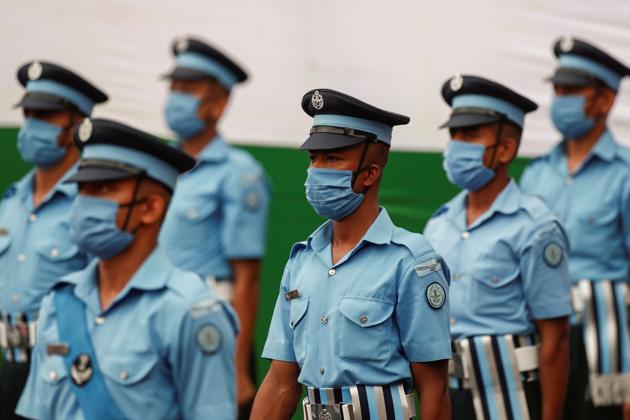 Soldiers wearing protective face masks attend the Independence Day celebrations at the historic Red Fort in Delhi, India, August 15, 2020. (REUTERS)