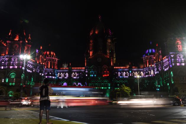 The Chatrapati Shivaji Railway terminus (CST) is seen lit up with India's national flag colours on the eve of the country's 74th Independence Day, which marks the end of British colonial rule, in Mumbai on August 14, 2020. (AFP)