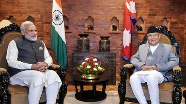 Prime Minister Narendra Modi with his Nepali counterpart KP Sharma Oli during delegation level talks in Kathmandu on Friday. (PTI)