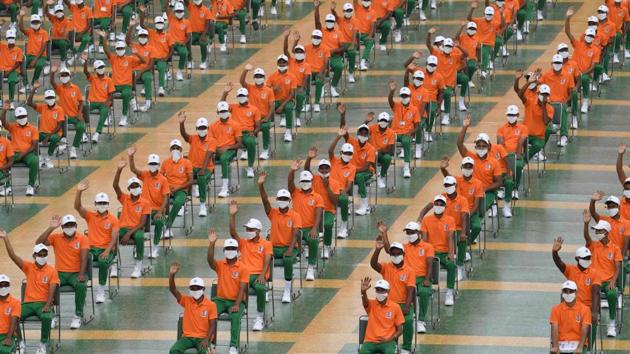 Independence Day celebrations at Red Fort were scaled down year with around 4,000 invites, a quarter of the usual issued to political leaders, officers, diplomats and others. School children, who usually attend the event dressed in the colours of the national flag, were not present this time due to the coronavirus. Instead, 500 NCC cadets were invited to the event. (Prakash Singh / AFP) 