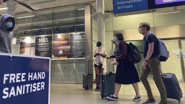 Travellers emerge from the Eurostar St Pancras International railway station, returning from France Friday Aug. 14, 2020, to avoid the quarantine restrictions. Travellers have to return to the UK before the 4.00 am Saturday deadline, to avoid new quarantine regulations imposed on people returning from France because of the coronavirus. (AP) Travellers emerge from the Eurostar St Pancras International railway station, returning from France Friday Aug. 14, 2020, to avoid the quarantine restrictions. Travellers have to return to the UK before the 4.00 am Saturday deadline, to avoid new quarantine regulations imposed on people returning from France because of the coronavirus. (AP)