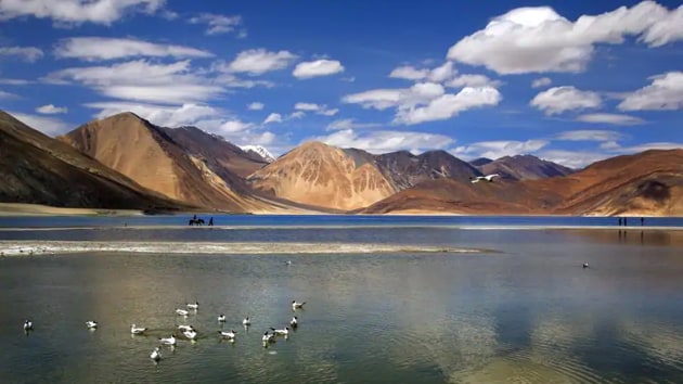 The PLA is sitting on green top of finger four feature on Pangong Tso.(AP photo)