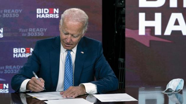 On the rising tide of hate and bigotry on India Americans, Biden will “enact legislation prohibiting someone convicted of a hate crime from purchasing or possessing a firearm.”(AP Photo) On the rising tide of hate and bigotry on India Americans, Biden will “enact legislation prohibiting someone convicted of a hate crime from purchasing or possessing a firearm.”(AP Photo)