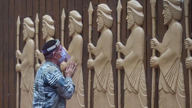 A man prays on the occasion of Navroz, at Dadar in Mumbai on August 16. Although India’s death rate has been lower than other nations, public health experts have cautioned that the toll has been on a steady rise with the increase in daily new infections across states. (Mitesh Bhuvad / PTI)