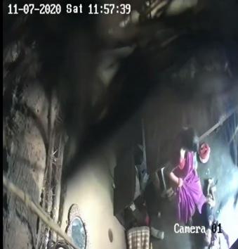 A woman from Odisha’s Puri is seen kicking her 15-month-old son in this CCTV footage. She has been booked on charges of beating her son and mother-in-law, police said.(HT Photo)