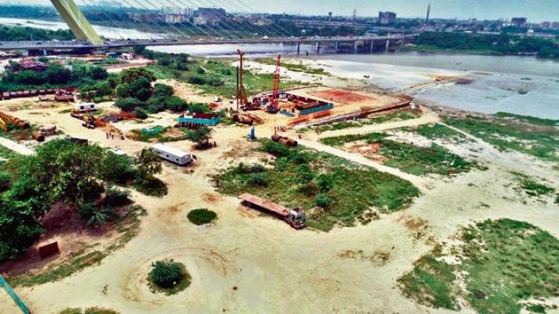 Construction work on for the bridge between Soorghat and Sonia Vihar. (HT Photo) Construction work on for the bridge between Soorghat and Sonia Vihar. (HT Photo)
