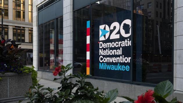 Signage for the Democratic National Convention is displayed near the Wisconsin Center in Milwaukee, Wisconsin, U.S., on Sunday, Aug. 16, 2020.(Bloomberg)