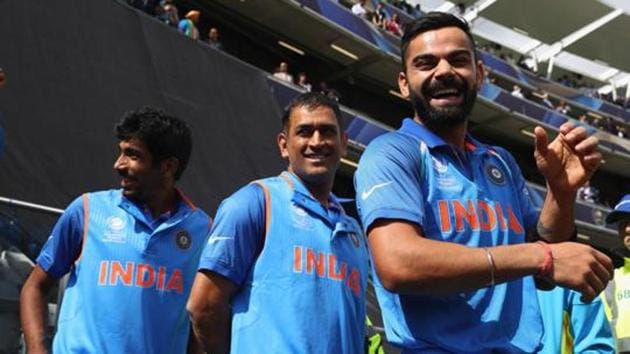 India captain Virat Kohli (R) alongside MS Dhoni (C) and Jasprit Bumrah (L) as the teams wait for the national anthems during the ICC Champions Trophy match between India and Pakistan at Edgbaston on June 4, 2017 in Birmingham. (Getty Images) India captain Virat Kohli (R) alongside MS Dhoni (C) and Jasprit Bumrah (L) as the teams wait for the national anthems during the ICC Champions Trophy match between India and Pakistan at Edgbaston on June 4, 2017 in Birmingham. (Getty Images)