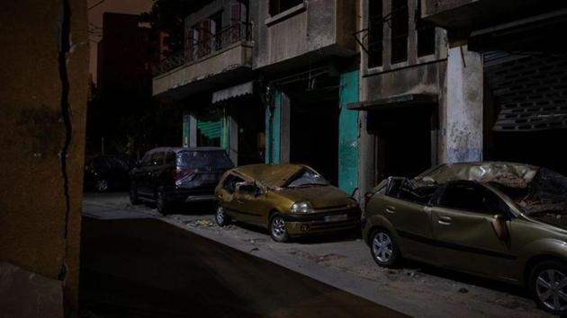 Damaged cars lined up on the side of a road at Karantina on August 12. The cluster of streets, with a slaughterhouse and a waste plant, saw one of the bloodiest massacres of Lebanon’s 1975-1990 civil war. Residents told Reuters that the blast did more damage in a few seconds than 15 years of war could manage. (Alkis Konstantinidis / REUTERS) Damaged cars lined up on the side of a road at Karantina on August 12. The cluster of streets, with a slaughterhouse and a waste plant, saw one of the bloodiest massacres of Lebanon’s 1975-1990 civil war. Residents told Reuters that the blast did more damage in a few seconds than 15 years of war could manage. (Alkis Konstantinidis / REUTERS)