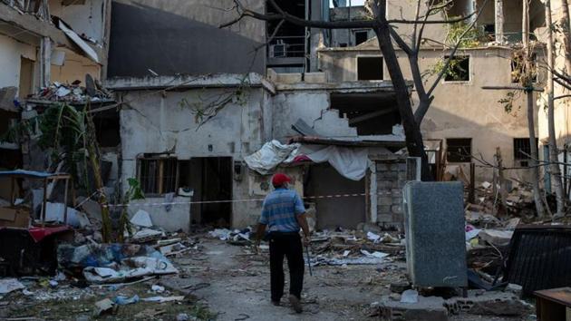 A man looks at the remains of his house that was damaged in the explosion at the Beirut port in the city’ s Karantina neighbourhood on August 12. Residents in this neglected neighbourhood in the Lebanese capital are still reeling from the explosion on August 4 that flattened homes and killed many neighbours who felt like family, Reuters reported. (Alkis Konstantinidis / REUTERS) A man looks at the remains of his house that was damaged in the explosion at the Beirut port in the city’ s Karantina neighbourhood on August 12. Residents in this neglected neighbourhood in the Lebanese capital are still reeling from the explosion on August 4 that flattened homes and killed many neighbours who felt like family, Reuters reported. (Alkis Konstantinidis / REUTERS)