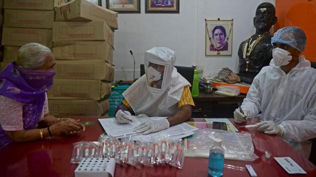 Health workers register a resident at a Covid-19 screening camp in Mumbai on August 17. The case fatality rate (CFR) in Maharashtra stands higher than the national average at 3.36%. The number of deaths being reported daily is also on the rise. Maharashtra has added 8,843 deaths or over 44% of fatalities to the toll in the past one month itself. On July 16, Maharashtra had 11,194 fatalities. (Indranil Mukherjee / AFP) Health workers register a resident at a Covid-19 screening camp in Mumbai on August 17. The case fatality rate (CFR) in Maharashtra stands higher than the national average at 3.36%. The number of deaths being reported daily is also on the rise. Maharashtra has added 8,843 deaths or over 44% of fatalities to the toll in the past one month itself. On July 16, Maharashtra had 11,194 fatalities. (Indranil Mukherjee / AFP)