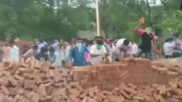 Locals in Bolpur in Bengal’s Birbhum district vandalised construction material stocked by authorities to build a wall around the ground of the Visva Bharati university where an annual fair is held. (ANI)