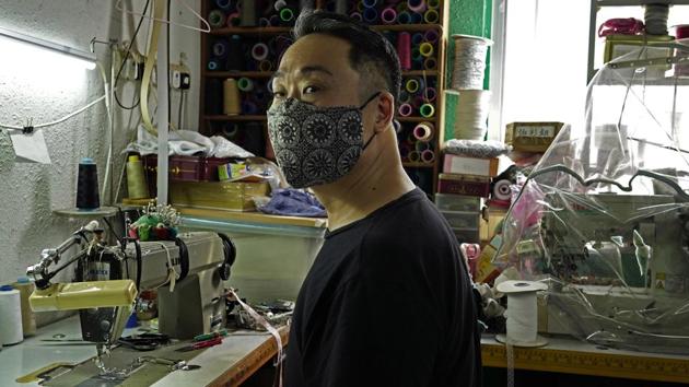 Edmond Kok, a Hong Kong theater costume designer and actor, wearing a face mask at his studio in Hong Kong Thursday, Aug. 6, 2020. (AP Photo/Vincent Yu) Edmond Kok, a Hong Kong theater costume designer and actor, wearing a face mask at his studio in Hong Kong Thursday, Aug. 6, 2020. (AP Photo/Vincent Yu)