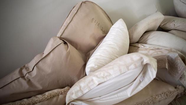 A garment cover is seen among pillows in the damaged house of Lebanese fashion designer Elie Saab, following a massive explosion at the Beirut port area, Lebanon, August 15, 2020. (REUTERS/Alkis Konstantinidis) A garment cover is seen among pillows in the damaged house of Lebanese fashion designer Elie Saab, following a massive explosion at the Beirut port area, Lebanon, August 15, 2020. (REUTERS/Alkis Konstantinidis)