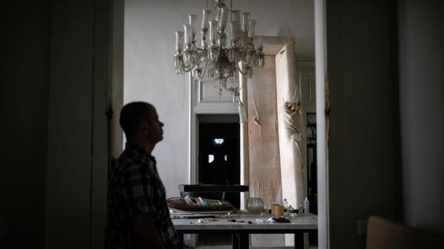 Lebanese fashion designer's Elie Saab personal aide, Johnny Zainoun, stands inside Saab's damaged house, following a massive explosion at the Beirut port area, Lebanon, August 15, 2020. (REUTERS/Alkis Konstantinidis) Lebanese fashion designer's Elie Saab personal aide, Johnny Zainoun, stands inside Saab's damaged house, following a massive explosion at the Beirut port area, Lebanon, August 15, 2020. (REUTERS/Alkis Konstantinidis)
