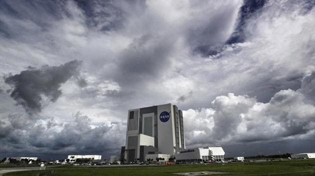 Storms clouds move into the area of Launch Complex 39-A at Kennedy Space Center.(AP)