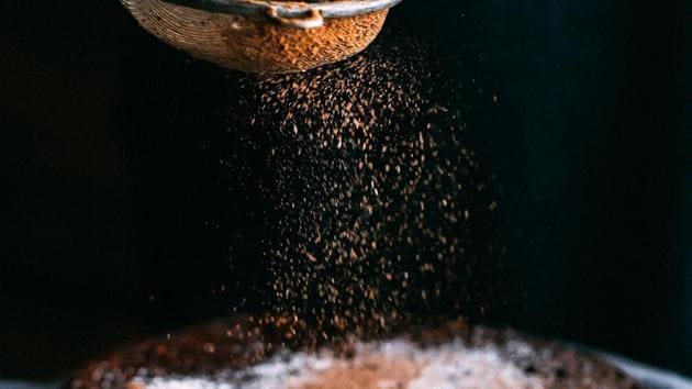 Combined with strong winds on Friday morning, the powder spread around the immediate vicinity of the factory, leaving a fine cocoa dusting.(Unsplash)