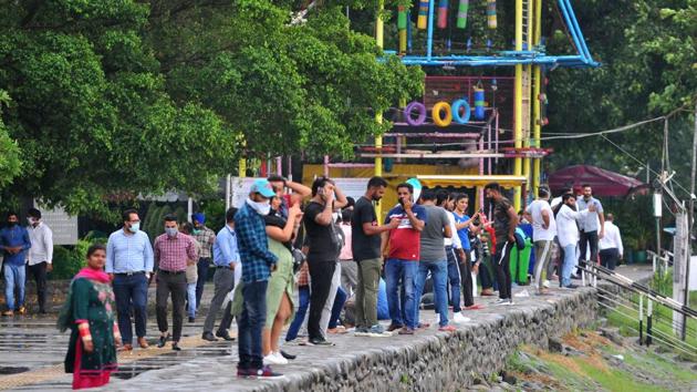 Even as cases in Chandigarh are going up, residents are seen without masks at Sukhna Lake in Chandigarh on Wednesday. An increase in cases is set to put a load on hospitals.(Ravi Kumar/HT) Even as cases in Chandigarh are going up, residents are seen without masks at Sukhna Lake in Chandigarh on Wednesday. An increase in cases is set to put a load on hospitals.(Ravi Kumar/HT)