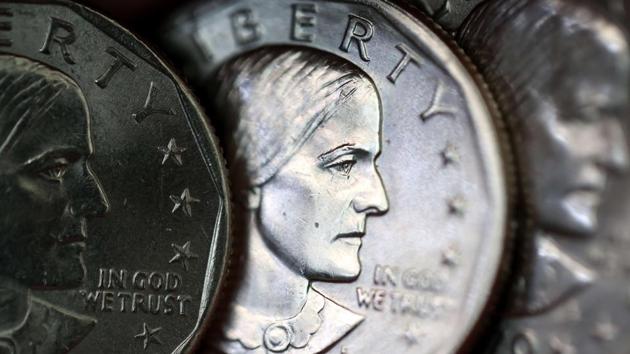 In this photo illustration, Susan B Anthony one dollar coins are displayed on August 18, 2020 in San Anselmo, California. On the 100th anniversary of 19th amendment, US President Donald Trump announced that he will pardon women's rights advocate Susan B Anthony, who was arrested for voting illegally in 1872.(AFP) In this photo illustration, Susan B Anthony one dollar coins are displayed on August 18, 2020 in San Anselmo, California. On the 100th anniversary of 19th amendment, US President Donald Trump announced that he will pardon women's rights advocate Susan B Anthony, who was arrested for voting illegally in 1872.(AFP)