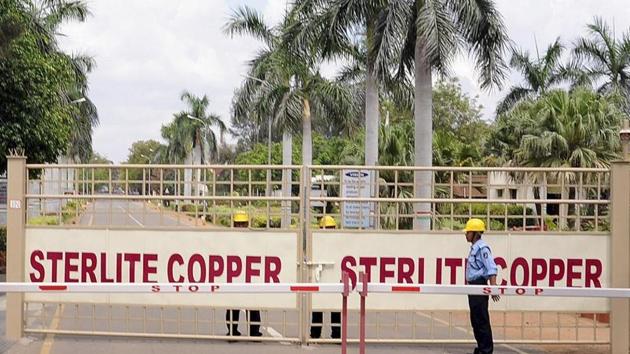A security guard stands in front of the main gate of Sterlite Industries Ltd's copper plant in Tuticorin in Tamil Nadu. (Reuters File Photo)