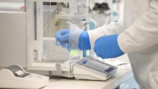 A chemist works at AstraZeneca's headquarters. (REUTERS) A chemist works at AstraZeneca's headquarters. (REUTERS)