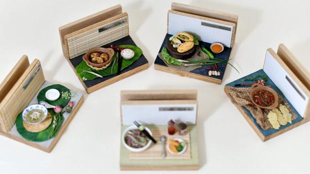 Miniature food creations by artist Nguyen Thi Ha An at her studio in Hanoi. An plans to expand the business to beverages -- including Vietnamese coffee and beer -- as they are served at a traditional open-air “bia hoi” bar. And although she has given up a potentially more stable career in architecture to pursue this niche craft, she believes she made the right choice. (Manan Vatsyayana / AFP) Miniature food creations by artist Nguyen Thi Ha An at her studio in Hanoi. An plans to expand the business to beverages -- including Vietnamese coffee and beer -- as they are served at a traditional open-air “bia hoi” bar. And although she has given up a potentially more stable career in architecture to pursue this niche craft, she believes she made the right choice. (Manan Vatsyayana / AFP)